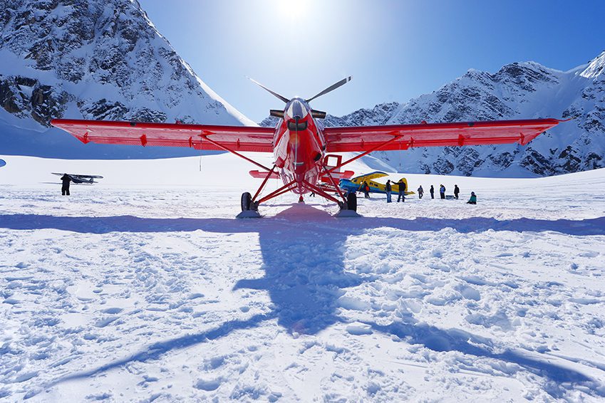 a plane landing on glacier in alaska