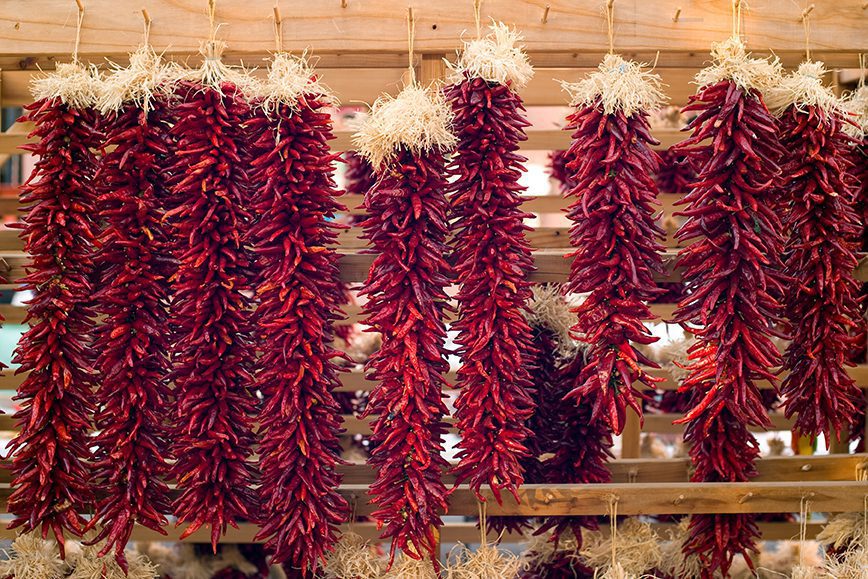 Chili peppers hanging on Santa Fe marketplace, New Mexico